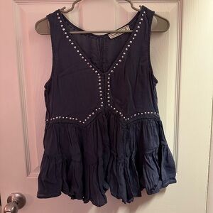 Blue flare tank top with rhinestone design.